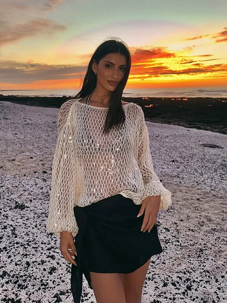 Sexy Solid Glitter Sequined Loose Short Tops Women See Through O Neck Long Sleeve Hollow Out Blouses 2026 Lady Beach Club Outfit