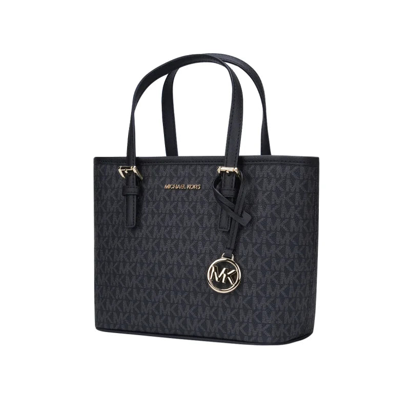 Sac fourre-tout porté main et croisé Michael Kors Ole Jet Set Travel Ultra Small en PVC imprimé avec cuir pour femme