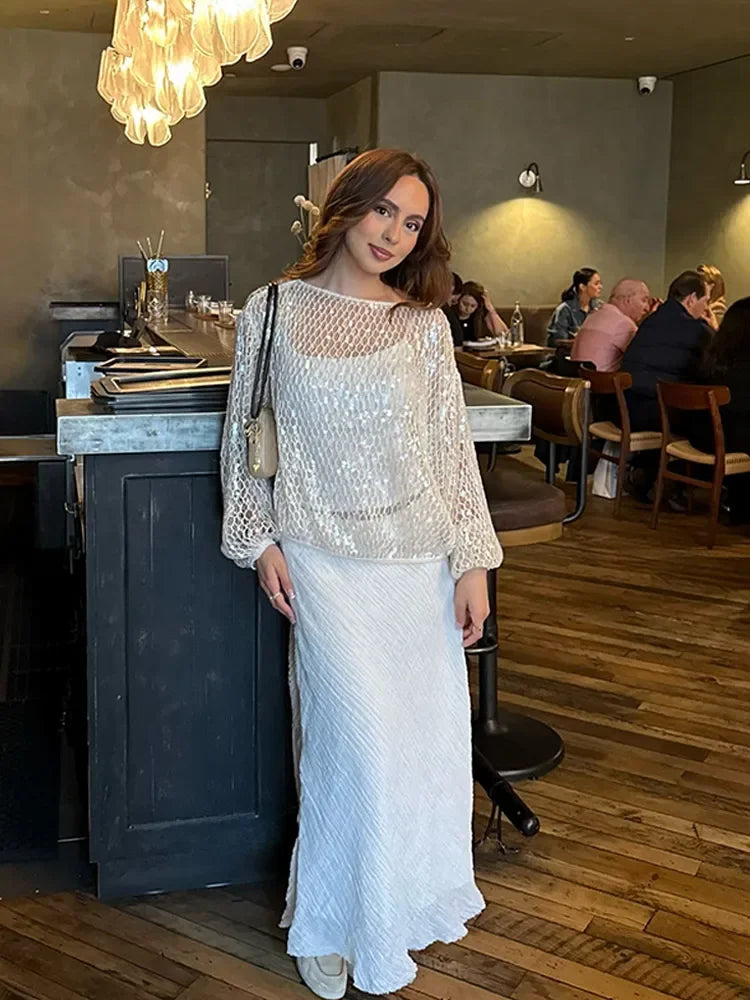 Sexy Solid Glitter Sequined Loose Short Tops Women See Through O Neck Long Sleeve Hollow Out Blouses 2026 Lady Beach Club Outfit