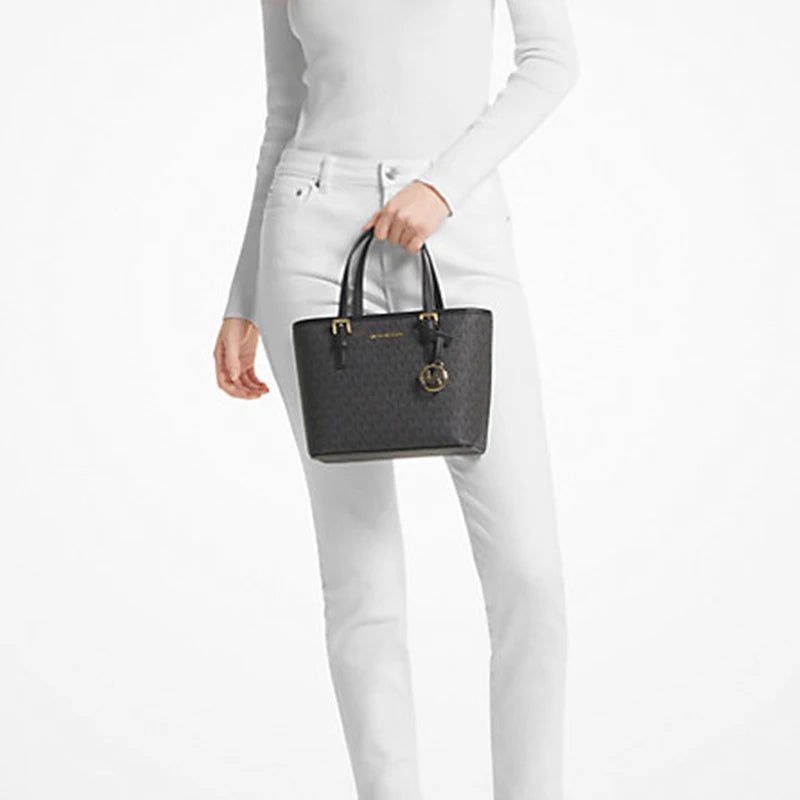 Sac fourre-tout porté main et croisé Michael Kors Ole Jet Set Travel Ultra Small en PVC imprimé avec cuir pour femme